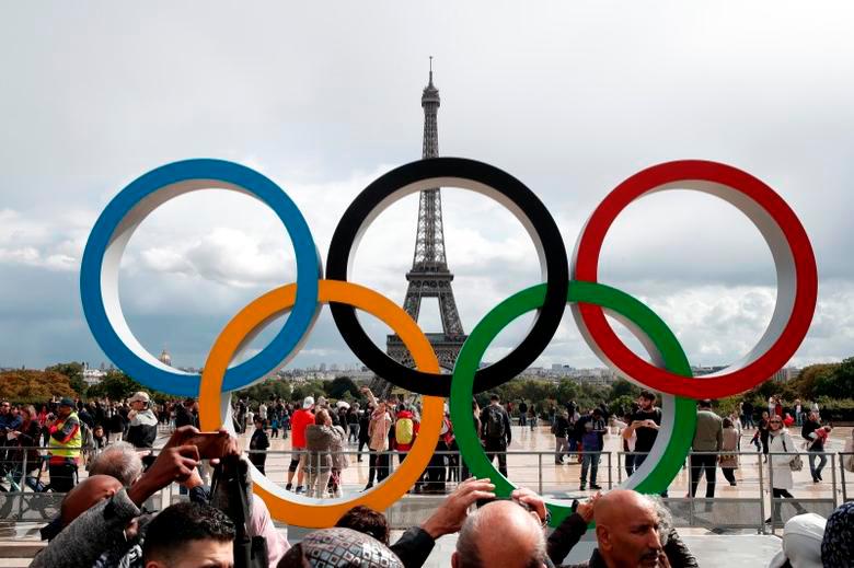 FILE PHOTO - Olympic rings to celebrate the IOC official announcement that Paris won the 2024 Olympic bid are seen in front of the Eiffel Tower at the Trocadero square in Paris, France, September 16, 2017. REUTERS/Benoit Tessier