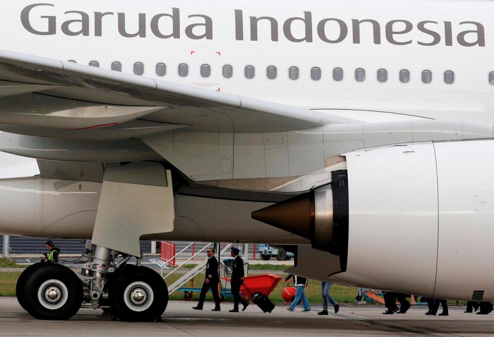 Indonesia to fire Garuda CEO for alleged smuggling of motorbike: minister