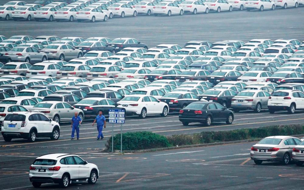 Newly manufactured cars are seen at the automobile terminal in the port of Dalian, Liaoning province, China. REUTERSPIX