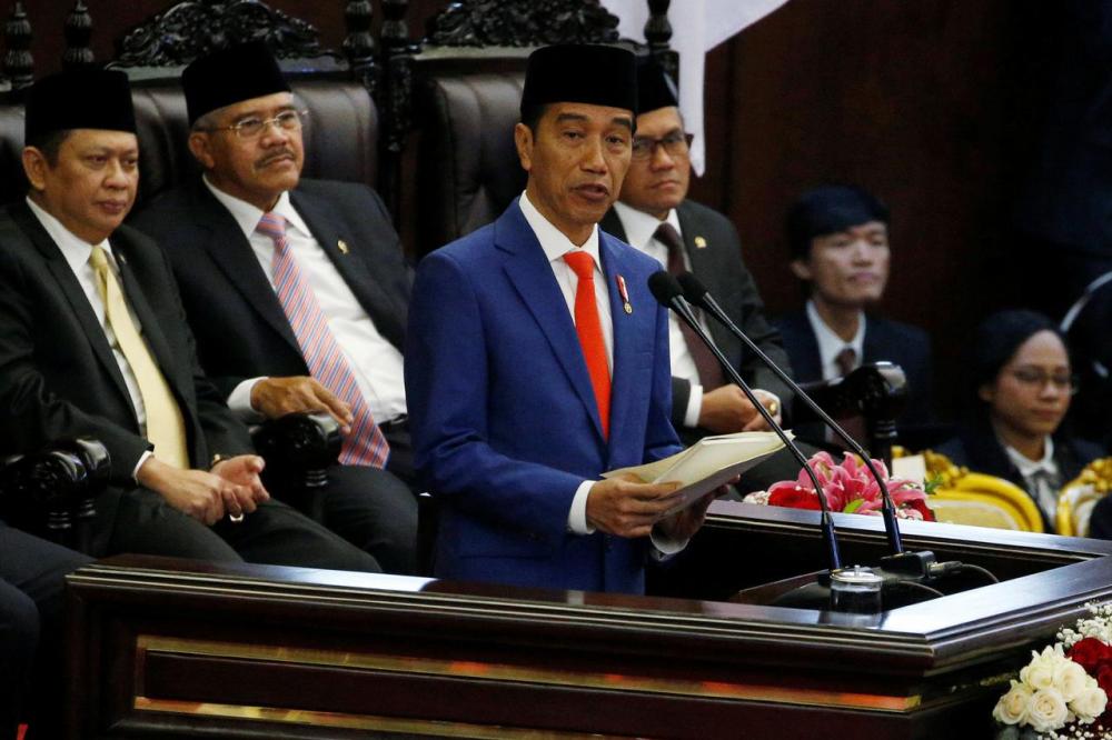 Indonesia President Joko Widodo delivers a speech in front of parliament members, ahead of Independence Day, at the parliament building in Jakarta, Indonesia, Aug 16, 2019. — Reuters