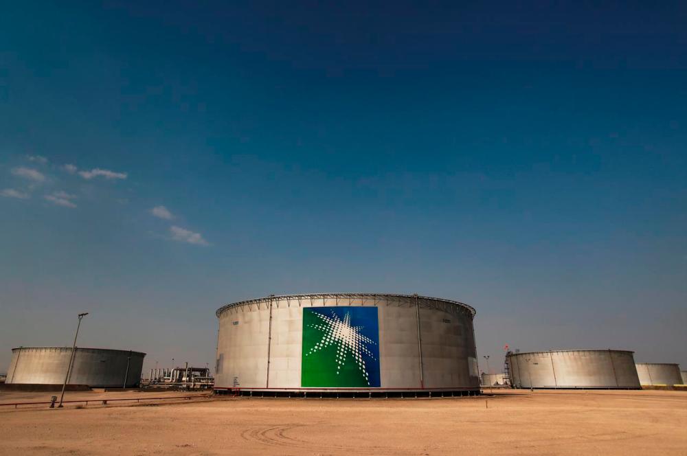 A view shows branded oil tanks at Saudi Aramco oil facility in Abqaiq, Saudi Arabia. REUTERSPIX