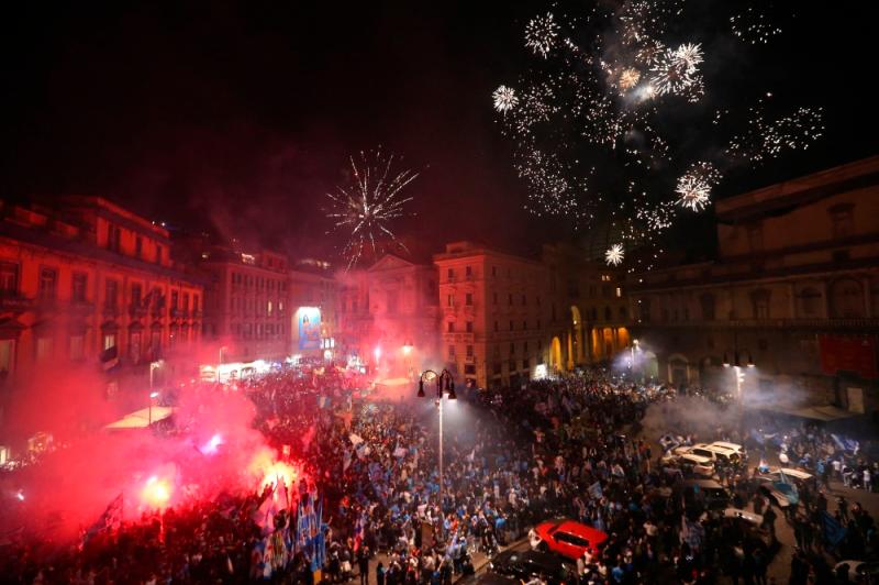 Fans of SSC Napoli celebrate with fireworks on May 4, 2023 in Naples after Napoli won the Italian champions “Scudetto” title following a decisive match in Udine//AFPix