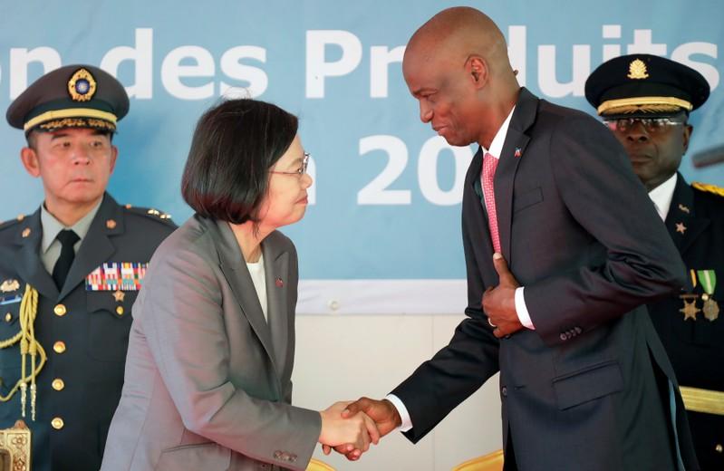Taiwan’s President Tsai Ing-wen shakes hands with Haiti’s President Jovenel Moise during her visit in Port-au-Prince, Haiti July 13, 2019.