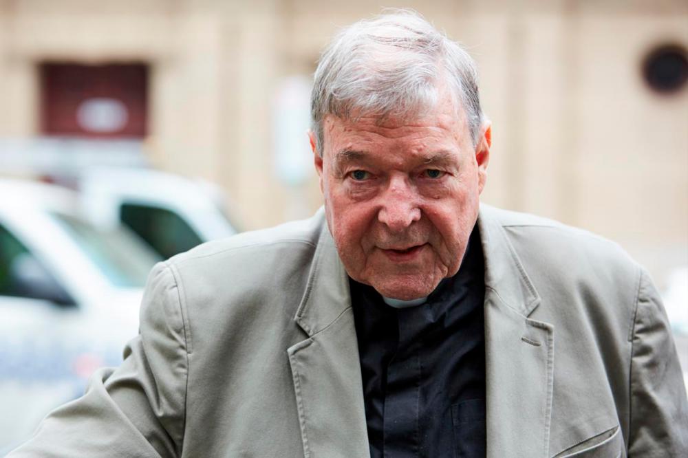 Australian media to be tried for contempt over Pell reporting