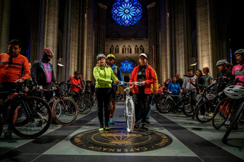 A white bicycle memorialising cyclists killed in traffic accidents is held during the 25th annual ‘Blessing of the Bicycles’ celebration at the Cathedral of St. John the Divine in New York city//AFPix