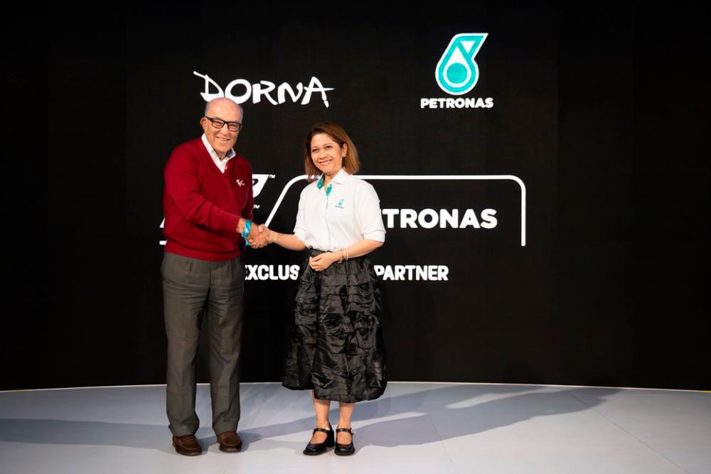 L-R: Carmelo Ezpeleta, Dorna Sports Chief Executive Officer and Datin Anita Azrina Abdul Aziz, PETRONAS Senior General Manager of Group Strategic Relations and Communications at the recent event announcing the use of 40 Per Cent Non-fossil Fuel for Moto2 and Moto3 championships.