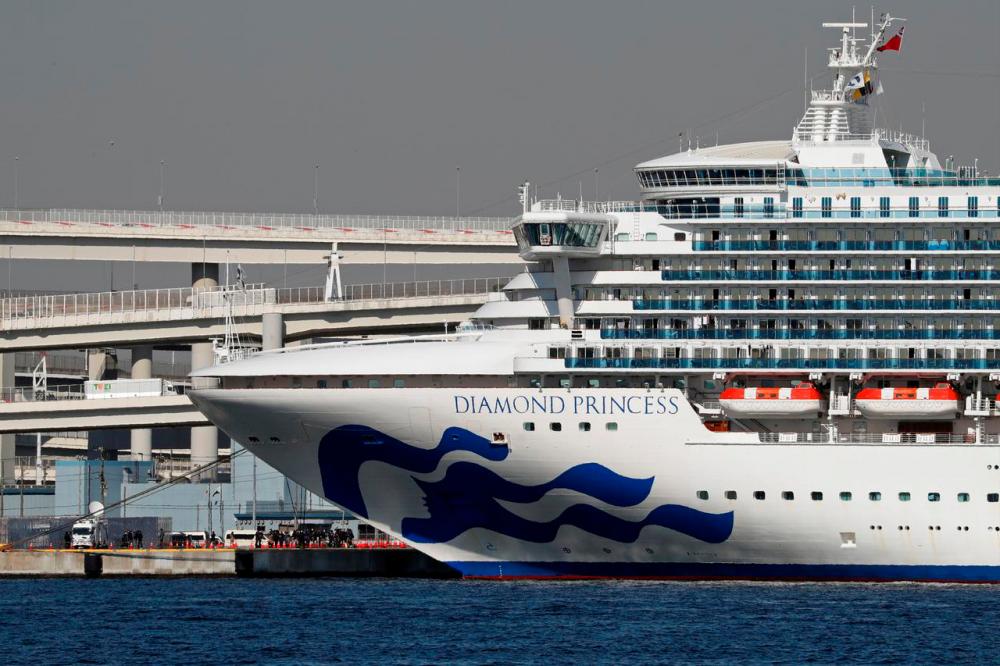 The cruise ship Diamond Princess, where dozens of passengers were tested positive for coronavirus, is seen at Daikoku Pier Cruise Terminal in Yokohama, south of Tokyo, Japan Feb 10. — Reuters