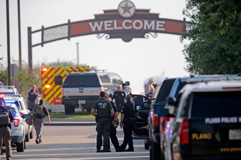 A gunman shot and killed eight people and wounded at least seven others at the Allen Premium Outlets mall in Allen, Texas yesterday,police said//AFPix