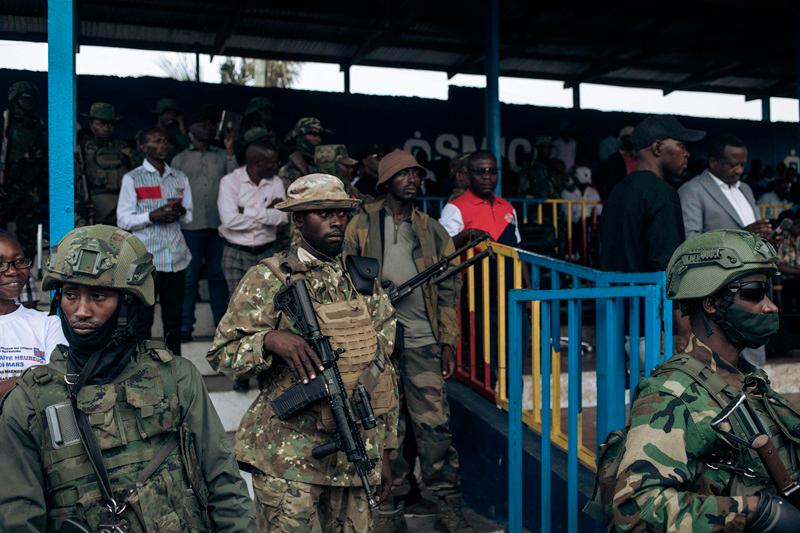 M23 soldiers are seen at the Stade de l'Unite' (Unity Stadium in French) in Goma on February 6, 2025 for a public gathering called by the armed group. Rwandan-backed M23 said Thursday it wanted to liberate all of the Congo in its first public meeting since seizing the eastern city of Goma after deadly clashes, as its fighters advanced towards another regional capital. After capturing Goma, the main city in North Kivu province, last week, the M23 and Rwandan troops launched a new offensive on Wednesday in a neighbouring province. - Alexis Huguet / AFP