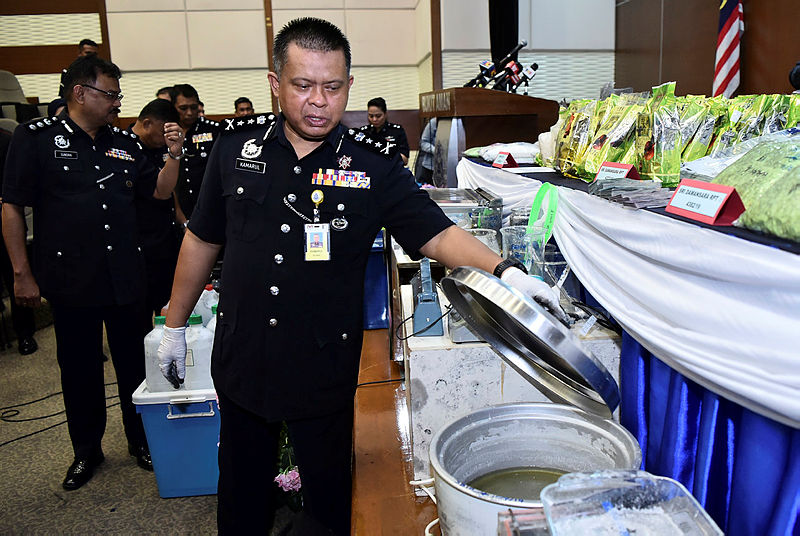 Bukit Aman Narcotics Criminal Investigation Department acting director Datuk Kamarulzaman Mamat show the drug processing equipments seized, on July 12, 2019. — Bernama