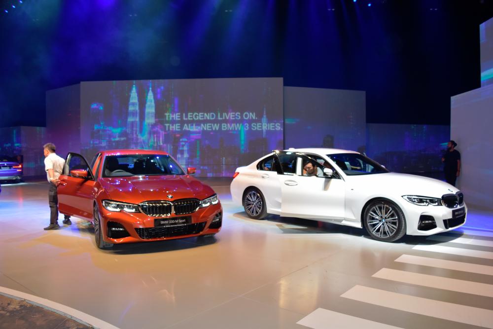 $!New BMW 3 Series launched, new Z4 sneak-previewed