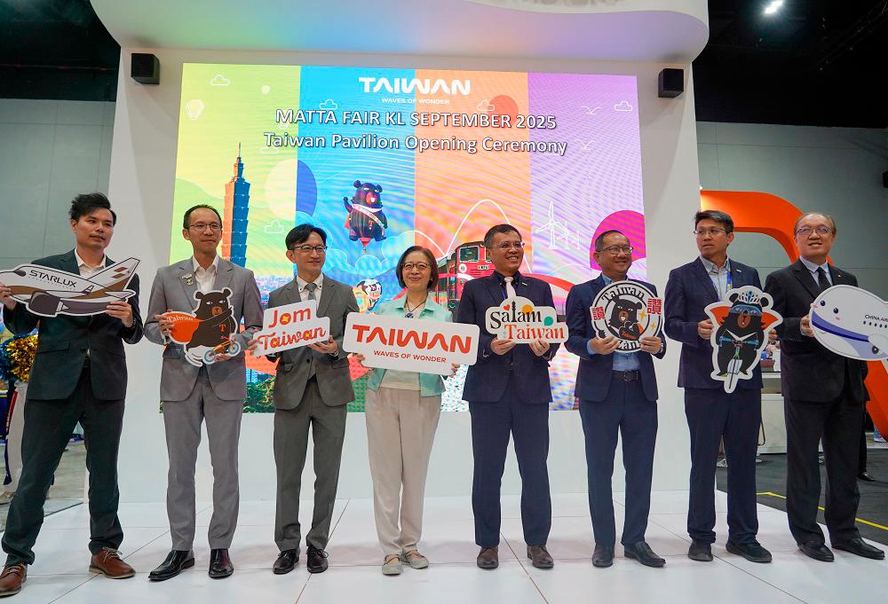 Huang (third from left), Yeh (fourth from left) and other VIPs opening the Taiwan Pavilion at the Matta Fair Kuala Lumpur 2025. – AMIRUL SYAFIQ/THESUN