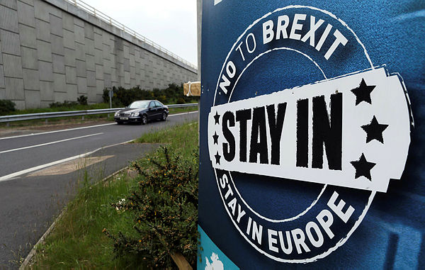 A “No To Brexit” sign is pictured on the outskirts of Newry in Northern Ireland on June 7, 2016. The border that divides the island of Ireland is now invisible, with just a few crumbling former customs buildings serving as reminders of a bygone era of a hard frontier between north and south. — AFP