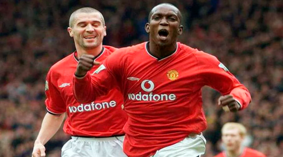 Dwight Yorke (Right) celebrates scoring with Roy Keane (Left) in the match against Coventry City in the English Premier League at Old Trafford on April 14, 2001. REUTERSPIX