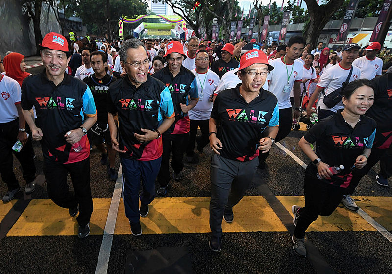 From left: Health director-general Datuk Dr Noor Hisham Abdullah, Health Minister Datuk Seri Dr Dzulkefly Ahmad, and Health Ministry secretary-general Datuk Dr Chen Chaw Ming, at the ‘Big Walk’ active lifestyle campaign, in Jalan Raja Laut, on April 7, 2019. — Bernama