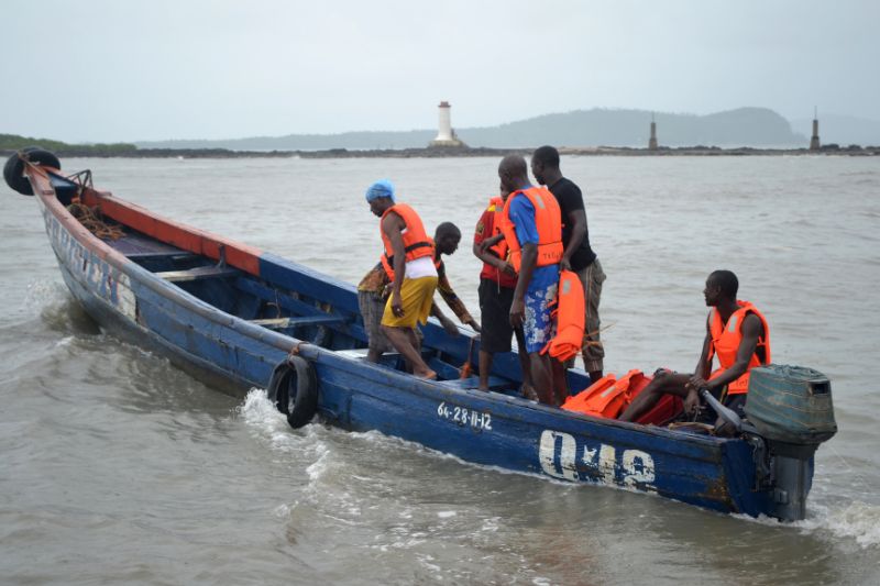 Rescue workers leave the coast to find the victims of a capsized pirogue on September 1, 2012 in Conakry. — AFP