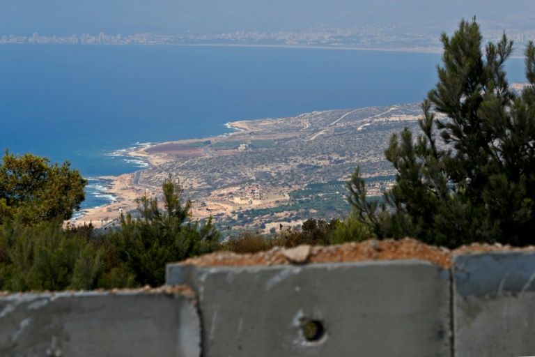 The picture taken on Sept 5, 2018 near Israel’s Rosh Hanikra border crossing with Lebanon shows the Naqoura border town in southern Lebanon where Lebanese and Israeli delegates are to hold UN-mediated talks on their disputed border. — AFP