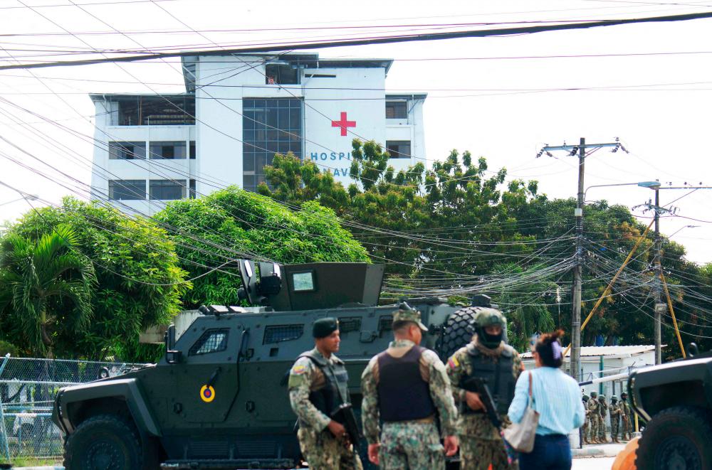 Army soldiers guard the surroundings of the Naval Hospital, where Ecuador’s ex-vice president Jorge Glas was taken due to health issues after refusing to eat prison food according to prison authority, in Guayaquil, April 8, 2024/AFPPix