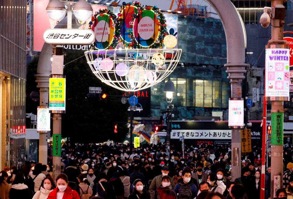 People make their way at a shopping district in Tokyo, Japan December 23, 2022. REUTERSPIX