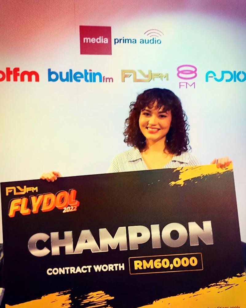 Arnold posing with her prize cheque. – ELYSHA ARNOLD $!Arnold posing with her prize cheque. – ELYSHA ARNOLD