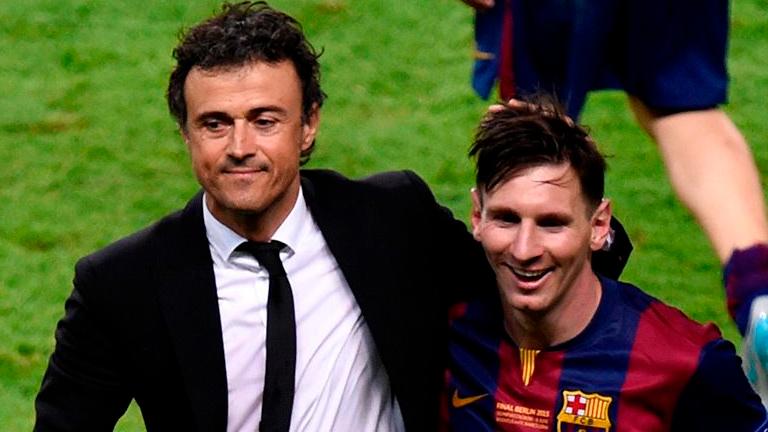 Former Barcelona coach Luis Enrique (left) and Lionel Messi.