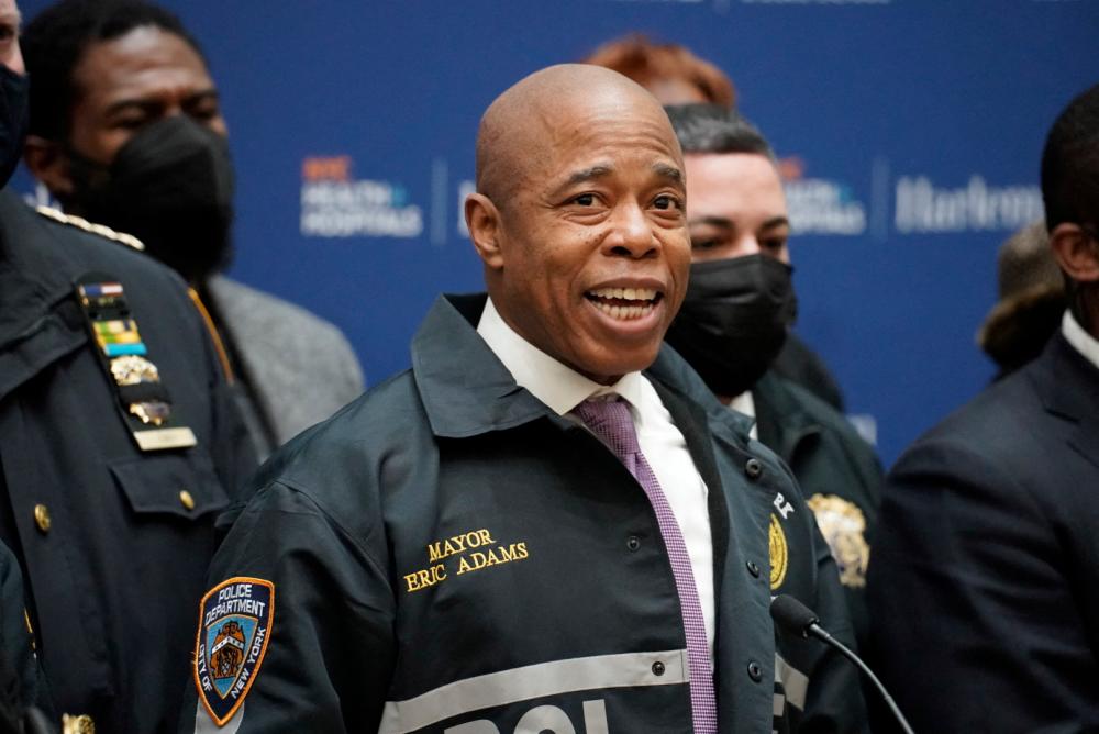 New York City Mayor Eric Adams speaks addresses the press about the scene where NYPD officers were shot while responding to a domestic violence call in the Harlem neighborhood of New York City, U.S., January 21, 2022. REUTERSpix