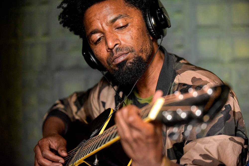 Ethiopian Tigrayan reggae singer Solomon Yikunoamlak, poses during an interview with AFP on July 7, 2019, in Mekele, the capital of Tigray Region, Ethiopia. — AFP