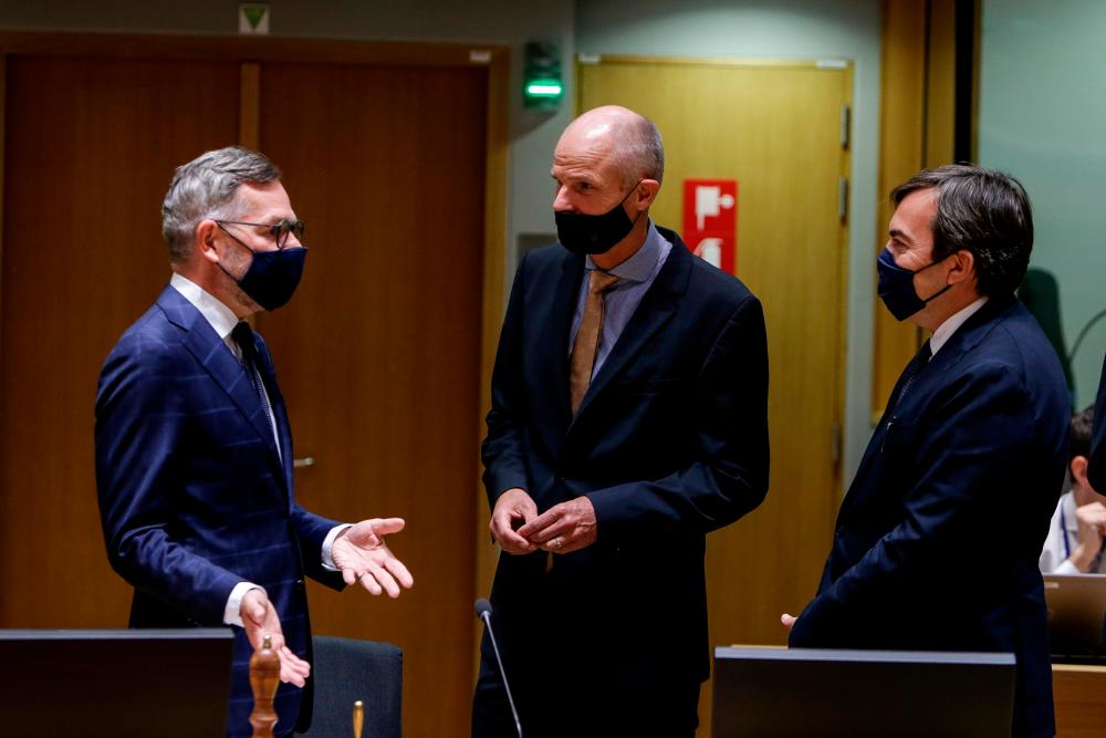 Fron left: Roth, Dutch Minister of Foreign Affairs Stef Blok, and Italian Minister of European Affairs Vincenzo Amendola attend a European affairs ministers council in Brussels, Belgium, on Tuesday. – REUTERSPIX