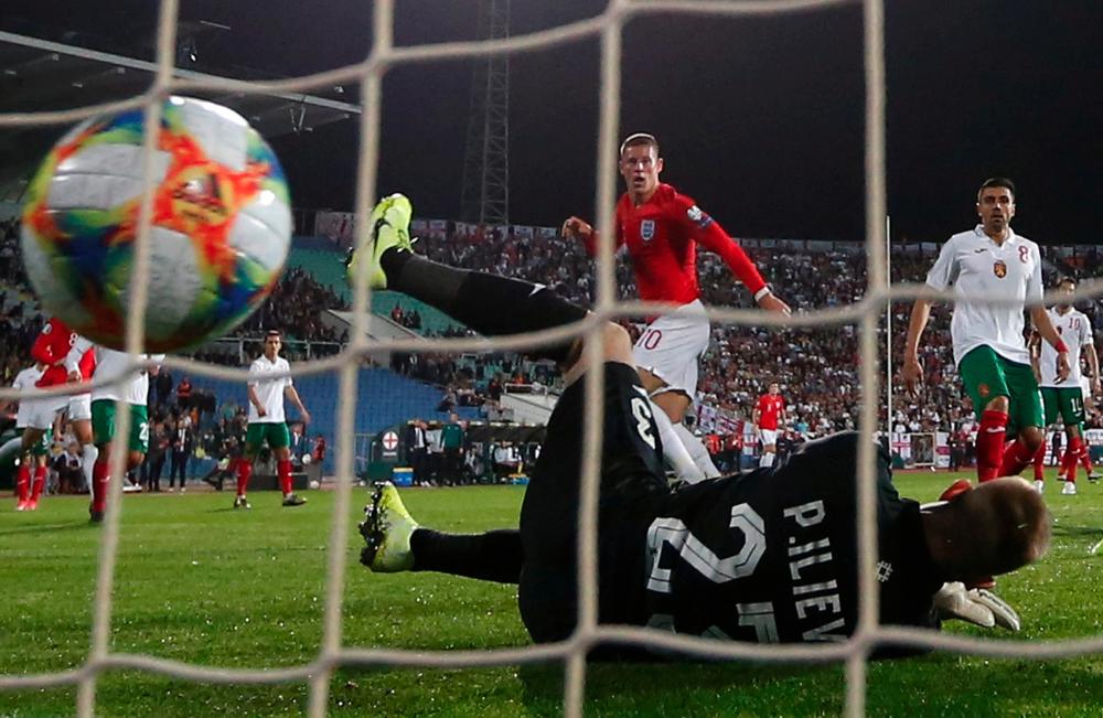 England's Ross Barkley scores their third goal during the Euro 2020 Qualifier between Bulgaria and England at Vasil Levski National Stadium, Sofia, Bulgaria on October 14, 2019. - Reuters