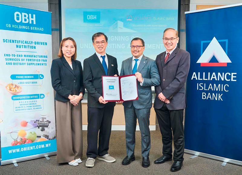 Posing after the agreement signing. (From left to right): OB Holdings Bhd executive director Lee Bao Yu, managing director Teoh Eng Sia, Alliance Islamic Bank Bhd CEO Rizal IL-Ehzan Fadil Azim and senior vice president, head of corporate finance Tee Kok Wah.