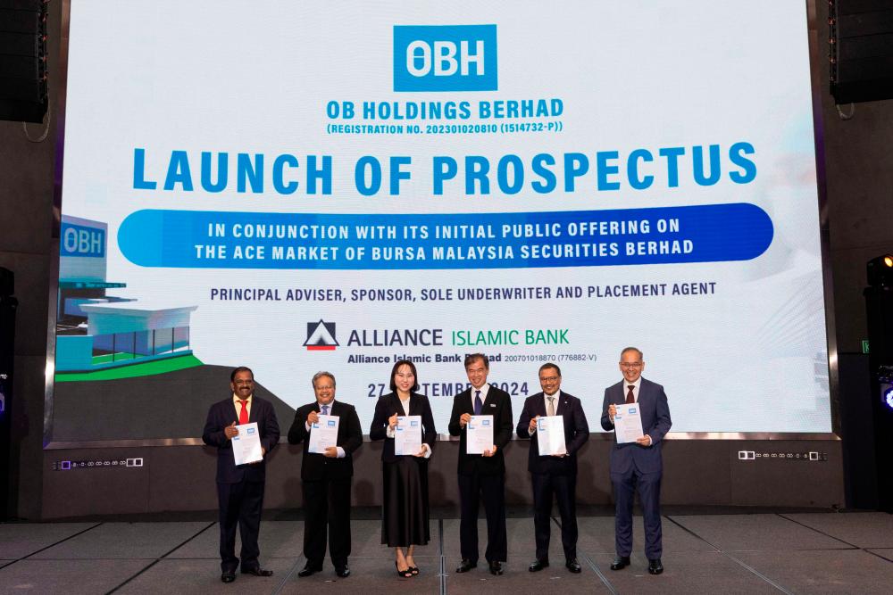 From left: OB Holdings Bhd’s independent non-executive directors Vasu Nallayan and Datuk Mohd Dusuki Ya’acob, executive director Lee Bao Yu and managing director Teoh Eng Sia, with Alliance Islamic Bank Bhd CEO Rizal Il-Ehzan Fadil Azim and senior vice president and head of corporate finance Tee Kok Wah on Friday