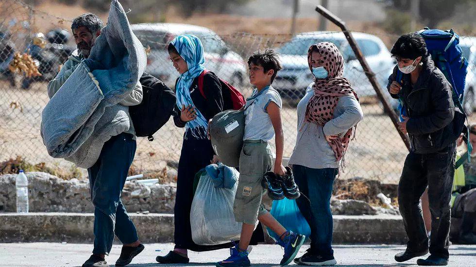 Asylum-seekers have been sleeping rough on Lesbos island since Wednesday, when some 11,000 fled the overcrowded Moria camp after it was gutted in apparent arson attacks. — AFP