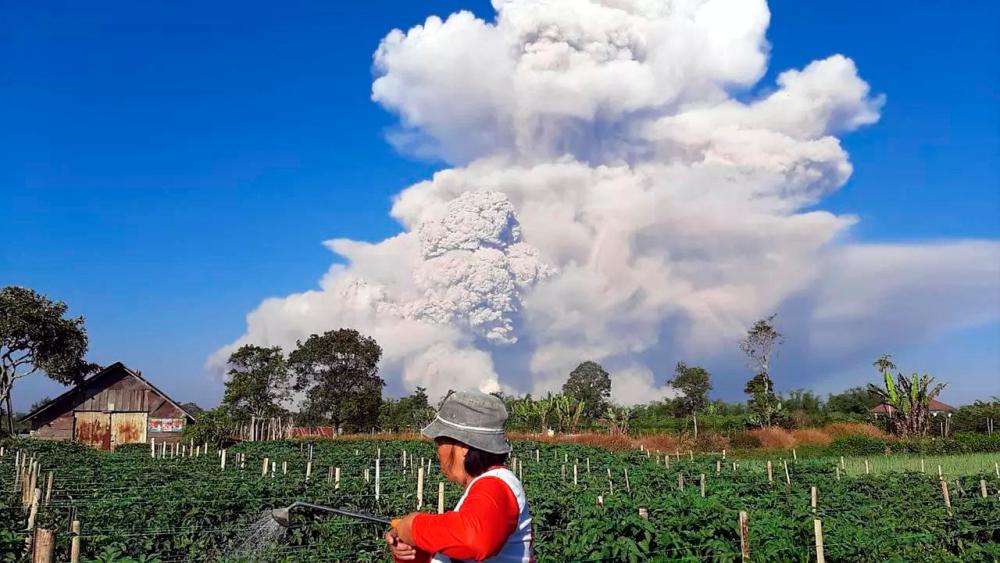 Indonesia’s Mount Sinabung erupted on Tuesday morning, spewing out a massive column of smoke and ash. — AFP