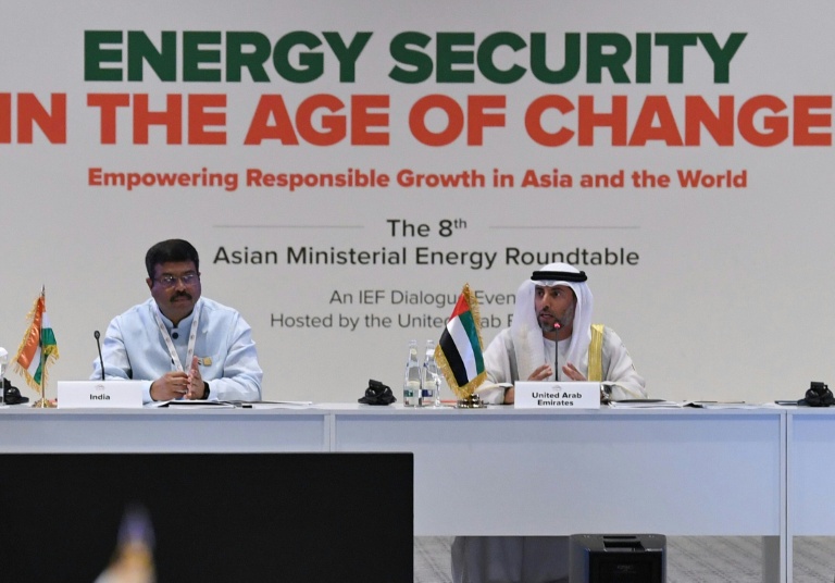 Indian Oil Minister Dharmendra Pradhan (L) listens as the United Arab Emirates Energy Minister Suheil al-Mazrouei (R ) addreses the World Energy Congress (WEC) in the Emirati capital Abu Dhabi. — AFP