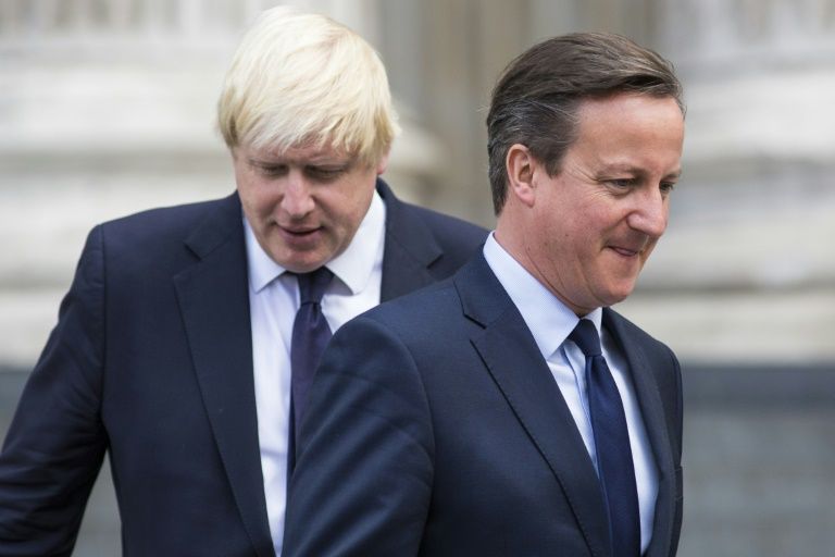 Former prime minister David Cameron, pictured in 2015 with then-London Mayor Boris Johnson, refused to apologise for calling the Brexit referendum. — AFP