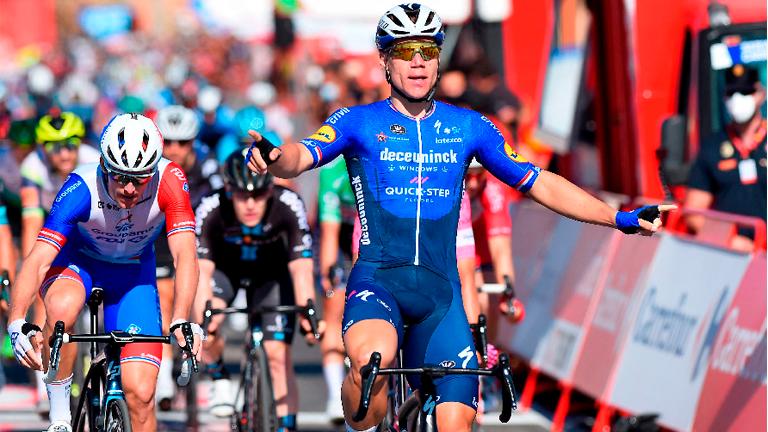 Team Deceuninck Quick Step’s rider Fabio Jakobsen (left) celebrates as he crosses the finish line to win the 4th stage of the 2021 La Vuelta cycling tour of Spain. – AFPPIX