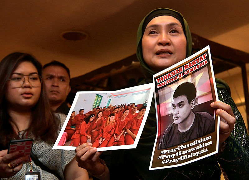 Zunita Sedini the picture of her son and 46 other Malaysians detained in Cambodia. — Bernama