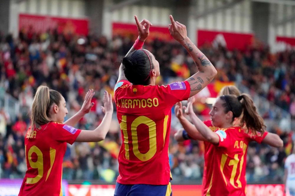 Spain's midfielder #10 Jennifer Hermoso (C) celebrates with teammates after scoring during the UEFA Women's Euro 2025 group A qualifying round day 2 football match between Spain and Czech Republic at El Plantio stadium, in Burgos on April 9, 2024. - AFPPIX