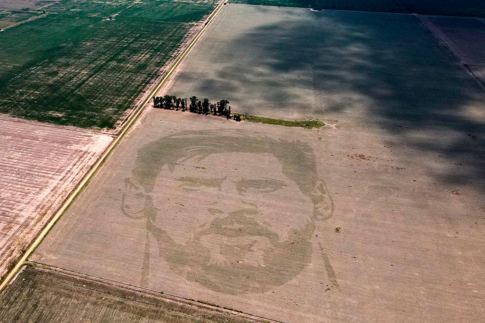 Aerial view of a corn field displaying an image of the face of Argentine football star Lionel Messi, in Ballesteros, Cordoba province, Argentina, on January 19, 2023. AFPPIX