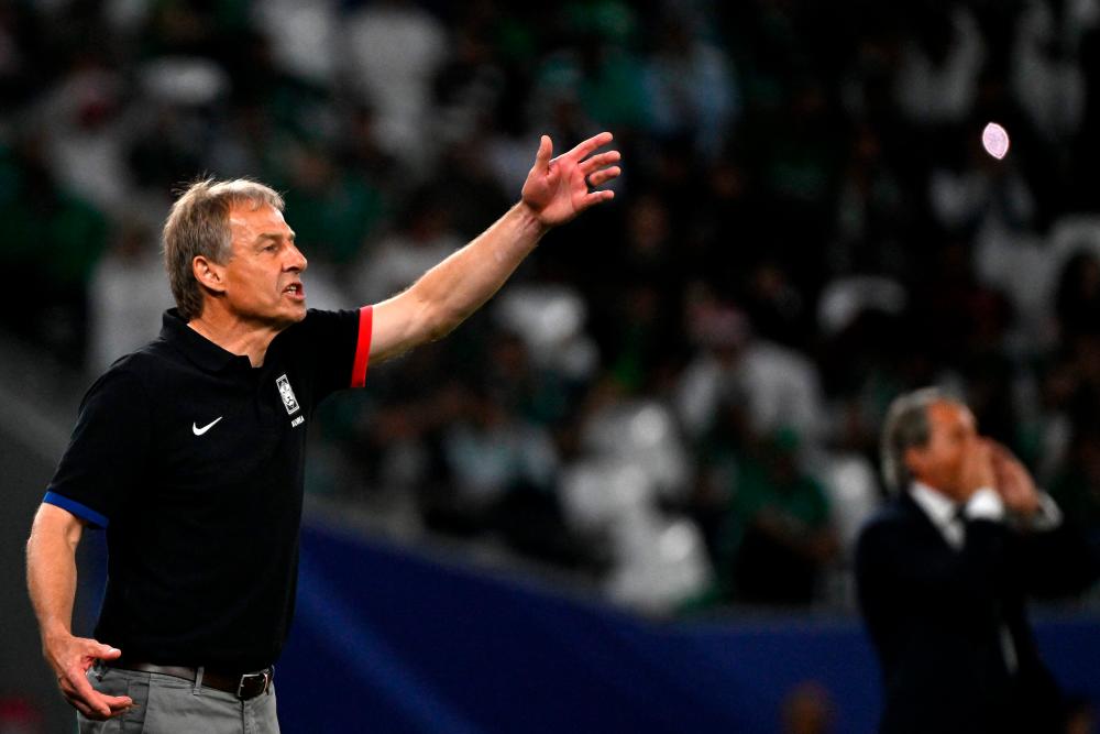 South Korea’s German coach Jurgen Klinsmann shouts instructions to his players from the touchline during the Qatar 2023 AFC Asian Cup football match between Saudi Arabia and South Korea at Education City Stadium in al-Rayyan, west of Doha, on January 30, 2024/AFPPix