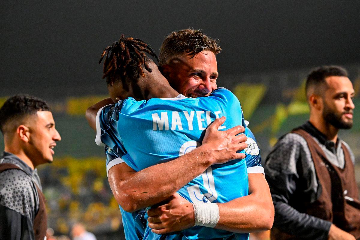 Pyramids’ Congolese forward #09 Fiston Mayele celebrates with Pyramids’ Egyptian forward #10 Ramadan Sobhi after scoring his team’s second goal during the second leg of the CAF Champions League final football match between Pyramids FC and Mamelodi Sundowns at 30 June Stadium in Cairo on June 1, 2025. (Photo by Khaled DESOUKI / AFP)
