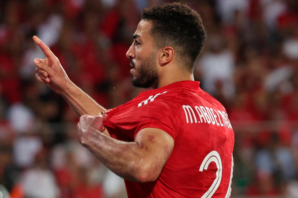 Ahly’s Egyptian defender Mohamed Abdelmonem celebrates scoring his team’s first goal during the second-leg of the CAF Champions League final football match between Morocco’s Wydad AC and Egypt’s Al-Ahly at the Mohammed V Stadium in Casablanca on June 11, 2023/AFPPix