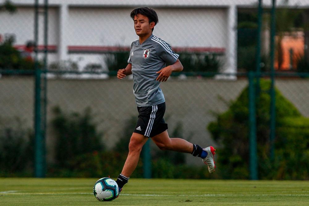 Takefusa Kubo takes part in a training session in Sao Paulo, Brazil, on June 13, 2019, on the eve of the start of the Copa America football tournament. - AFP