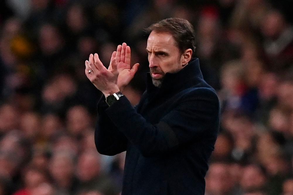 England's manager Gareth Southgate gestures on the touchline during the international friendly football match between England and Brazil at Wembley stadium in north London on March 23, 2024. - AFPPIX