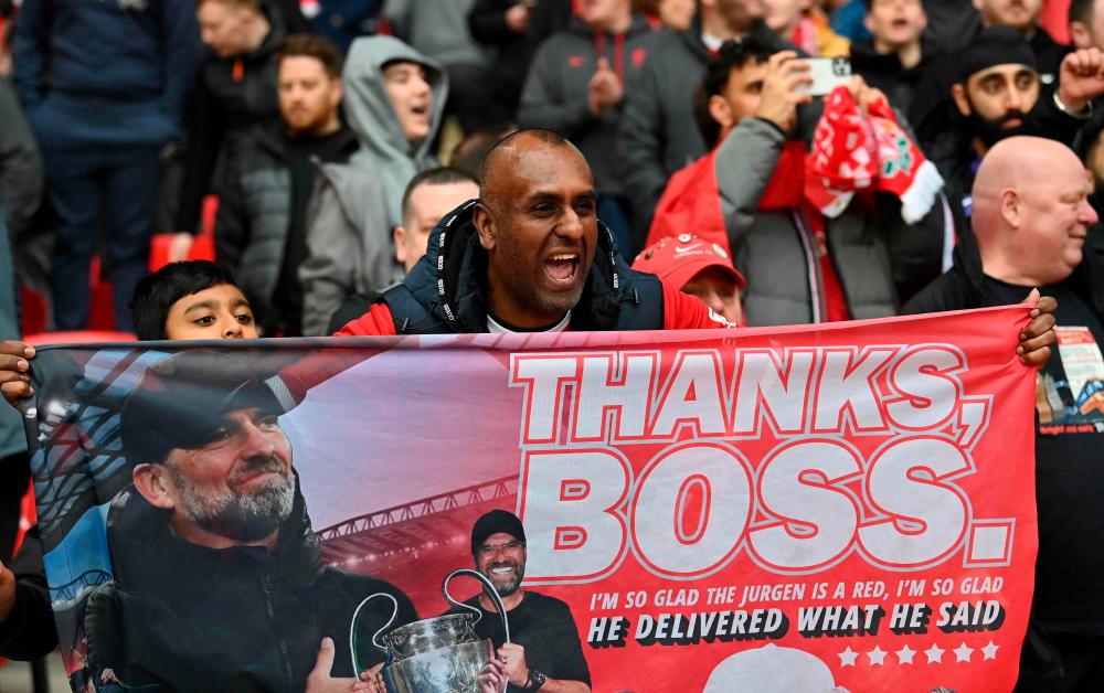A Liverpool fan reacts ahead of the English League Cup final football match between Chelsea and Liverpool at Wembley stadium, in London, on February 25, 2024/AFPPix