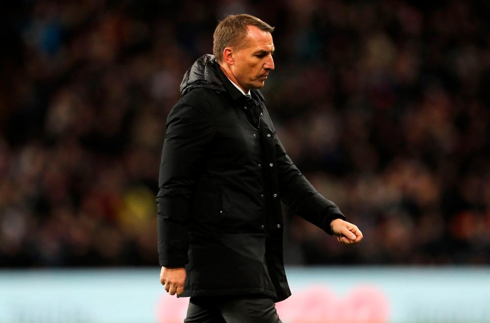 Leicester City's Northern Irish manager Brendan Rodgers leaves the pitch after the English Premier League football match between Aston Villa and Leicester City at Villa Park in Birmingham, central England on December 5, 2021. Aston Villa won the match 2-1. AFPpix