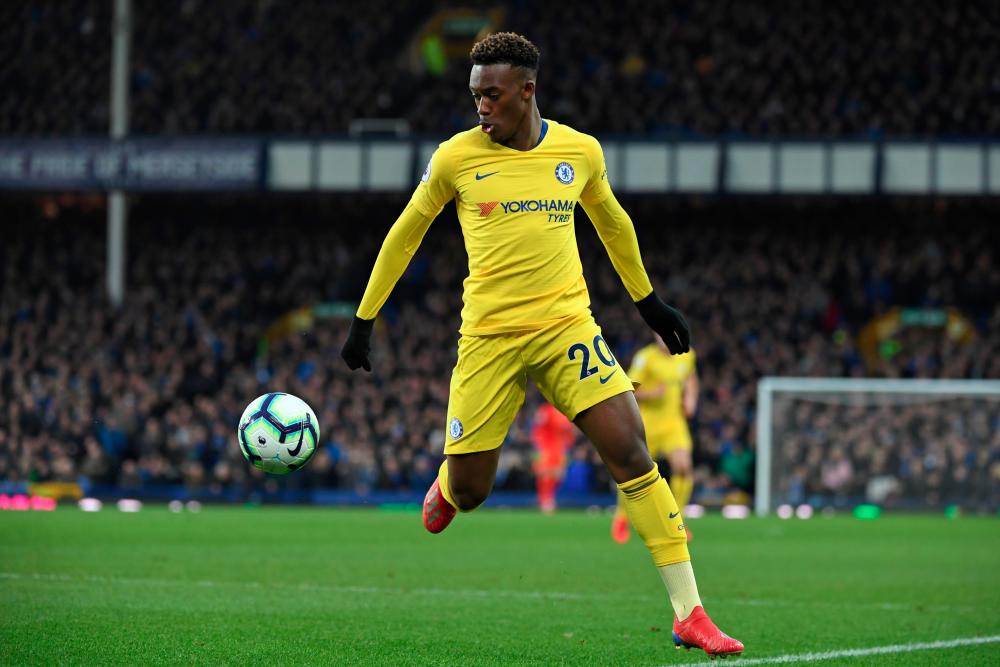 Chelsea's English midfielder Callum Hudson-Odoi controls the ball during the English Premier League football match between Everton and Chelsea at Goodison Park in Liverpool, north west England on March 17, 2019. — AFP