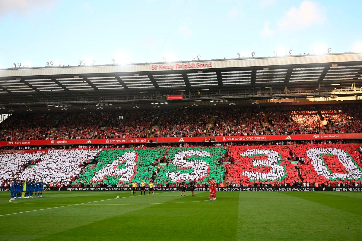 Players observe a moment of silence to pay tribute to Liverpool’s late Portuguese forward Diogo Jota and his brother Andre Silva, who passed away in a car crash ahead of the English Premier League football match between Liverpool and Bournemouth at Anfield in Liverpool, north west England on August 15. AFPPix