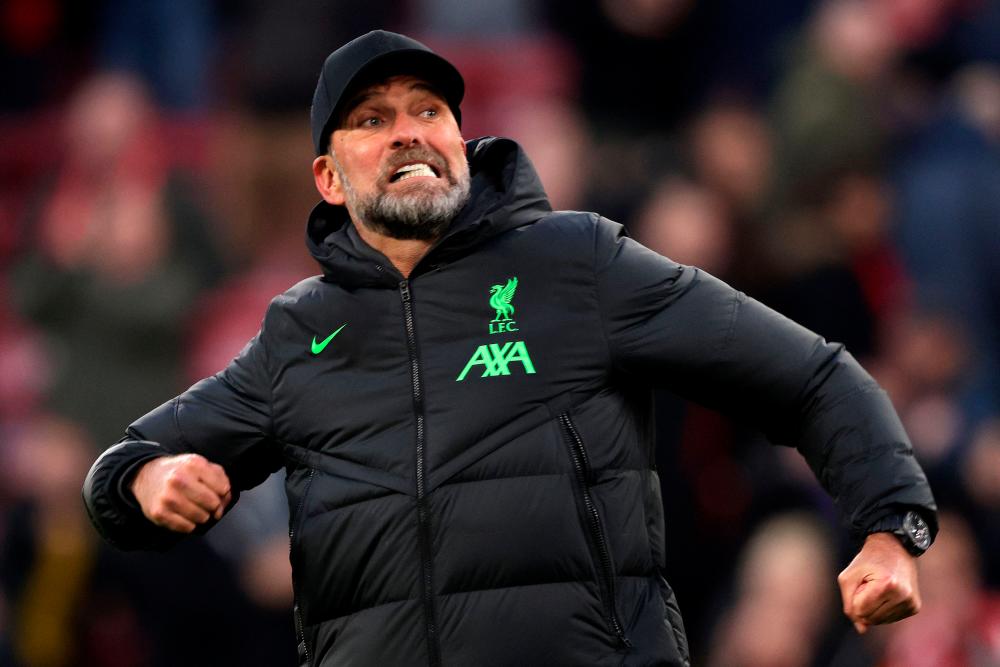 Liverpool’s German manager Jurgen Klopp celebrates at the end of the English Premier League football match between Liverpool and Burnley at Anfield in Liverpool, north west England on February 10, 2024/AFPPix
