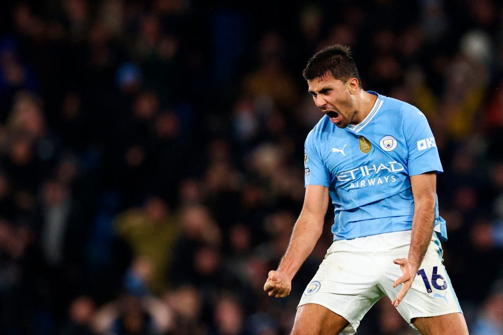 Manchester City’s Spanish midfielder #16 Rodri celebrates after scoring his team first goal during the English Premier League football match between Manchester City and Chelsea at the Etihad Stadium in Manchester, north west England, on February 17, 2024/AFPPix
